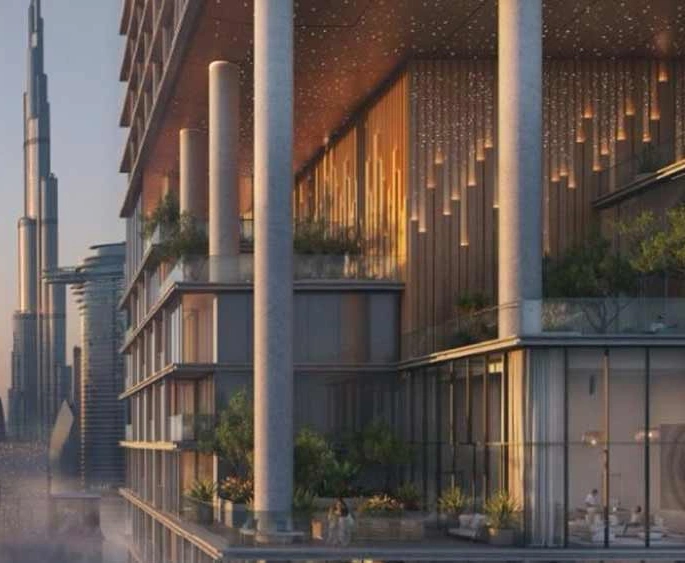Verve Citywalk by Meraas exterior view featuring modern low-rise buildings, lush landscaped gardens, and a vibrant urban setting in Dubai.