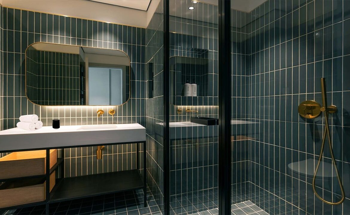 Luxurious bathroom in the rental studio at Upside Living, featuring high-quality materials and modern fixtures.