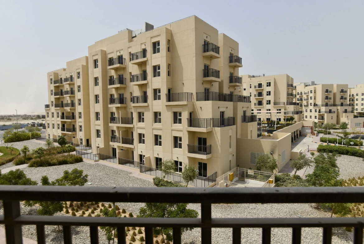 Front view of the balcony in a 2-bedroom apartment for sale in Al Rimth 13, Remraam, Dubai.