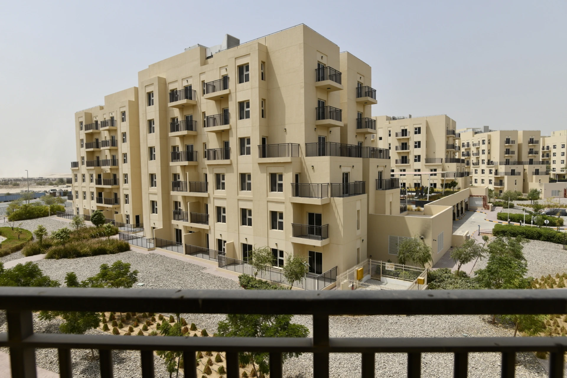 Front view of the balcony in a 2-bedroom apartment for sale in Al Rimth 13, Remraam, Dubai.