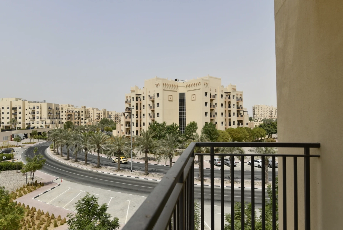 Balcony in a 2-bedroom apartment for sale in Al Rimth 13, Remraam, Dubai.