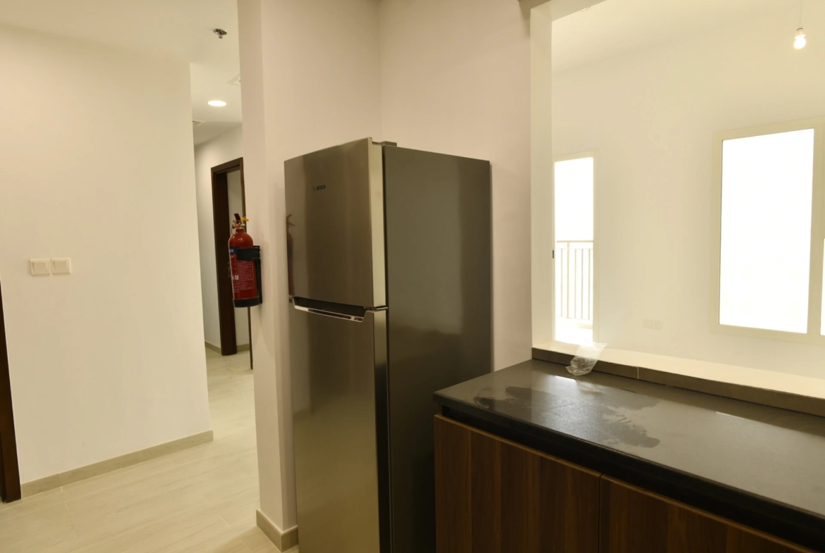 Additional view of the kitchen in a 2-bedroom apartment for sale in Al Rimth 13, Remraam, Dubai.