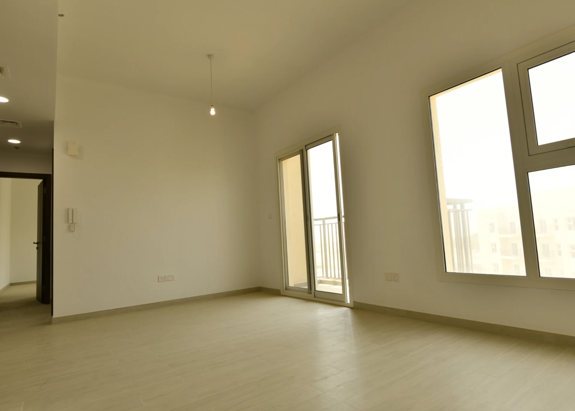 Another view of the living room in a 2-bedroom apartment for sale in Al Rimth 13, Remraam, Dubai