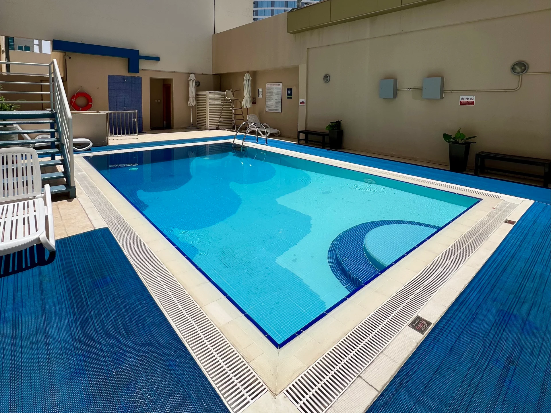 Swimming pool available for residents of a furnished 1-bedroom apartment for rent in Mayfair Residency, Business Bay, Dubai.