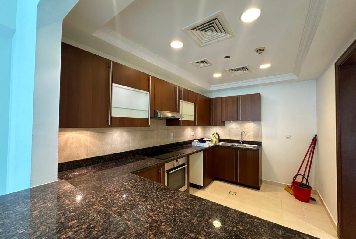 Third view of the kitchen in a 2-bedroom apartment for rent in Golden Mile 5, Palm Jumeirah, Dubai.