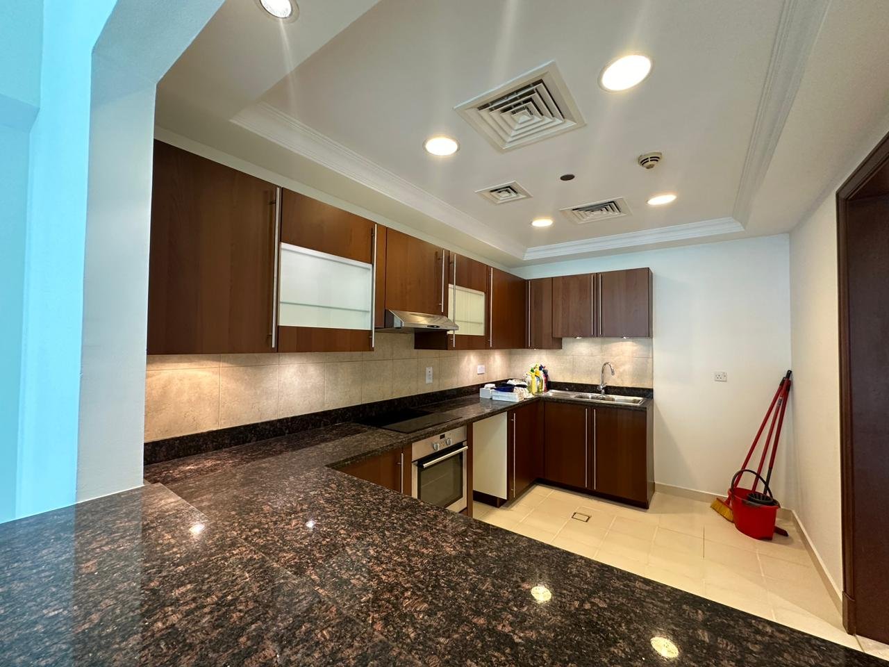 Third view of the kitchen in a 2-bedroom apartment for rent in Golden Mile 5, Palm Jumeirah, Dubai.