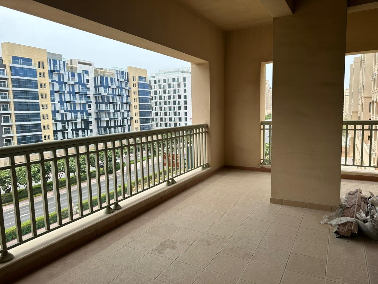 Balcony with a street view in a 2-bedroom apartment for rent in Golden Mile 5, Palm Jumeirah, Dubai.