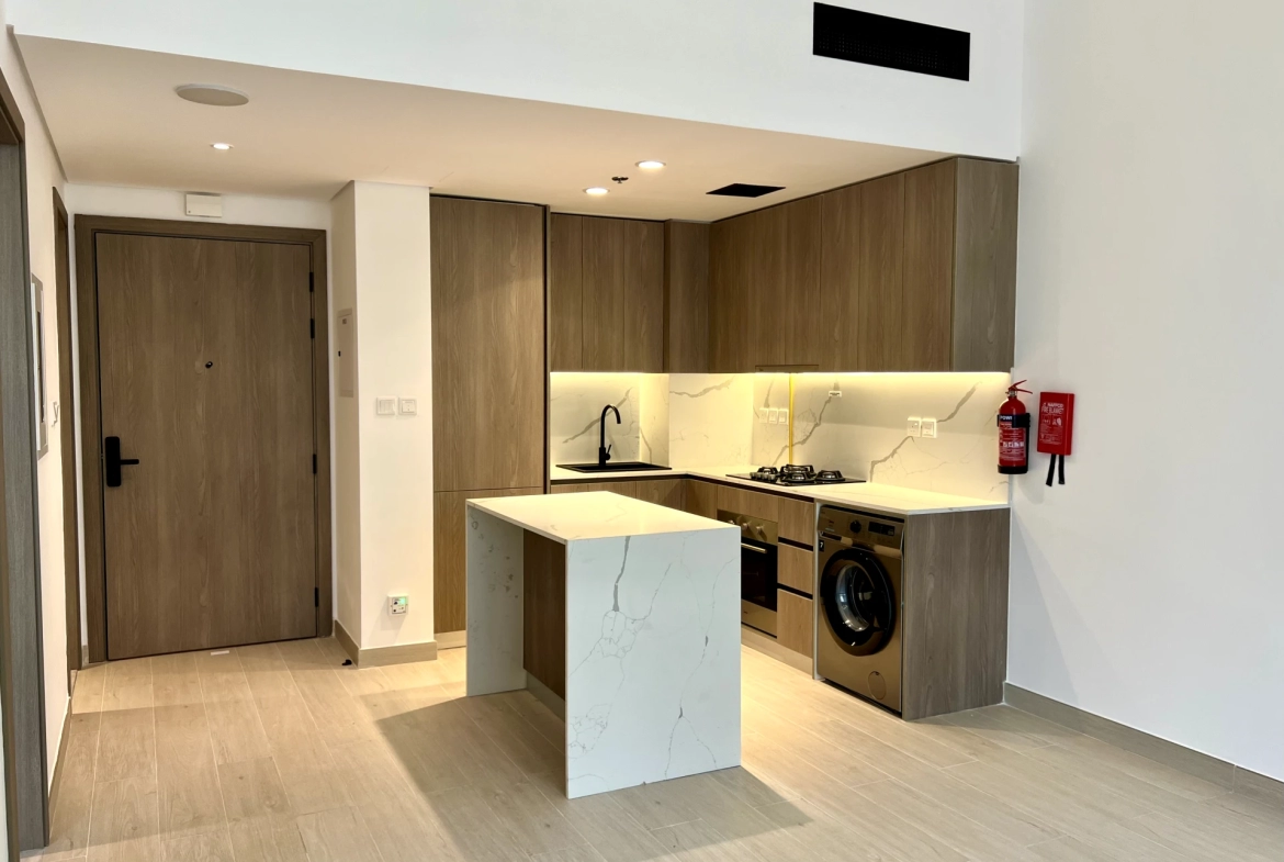 Kitchen in a 1-bedroom apartment for rent in Laya Heights, Studio City, Dubai