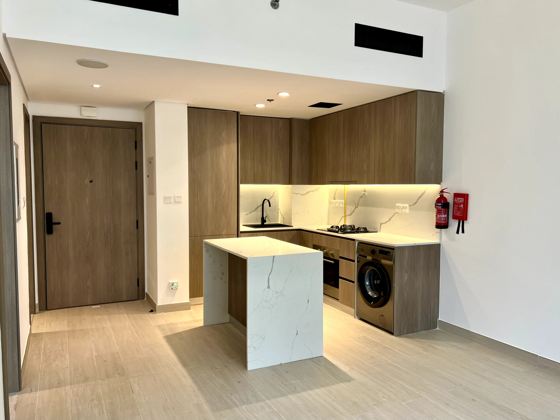 Kitchen in a 1-bedroom apartment for rent in Laya Heights, Studio City, Dubai