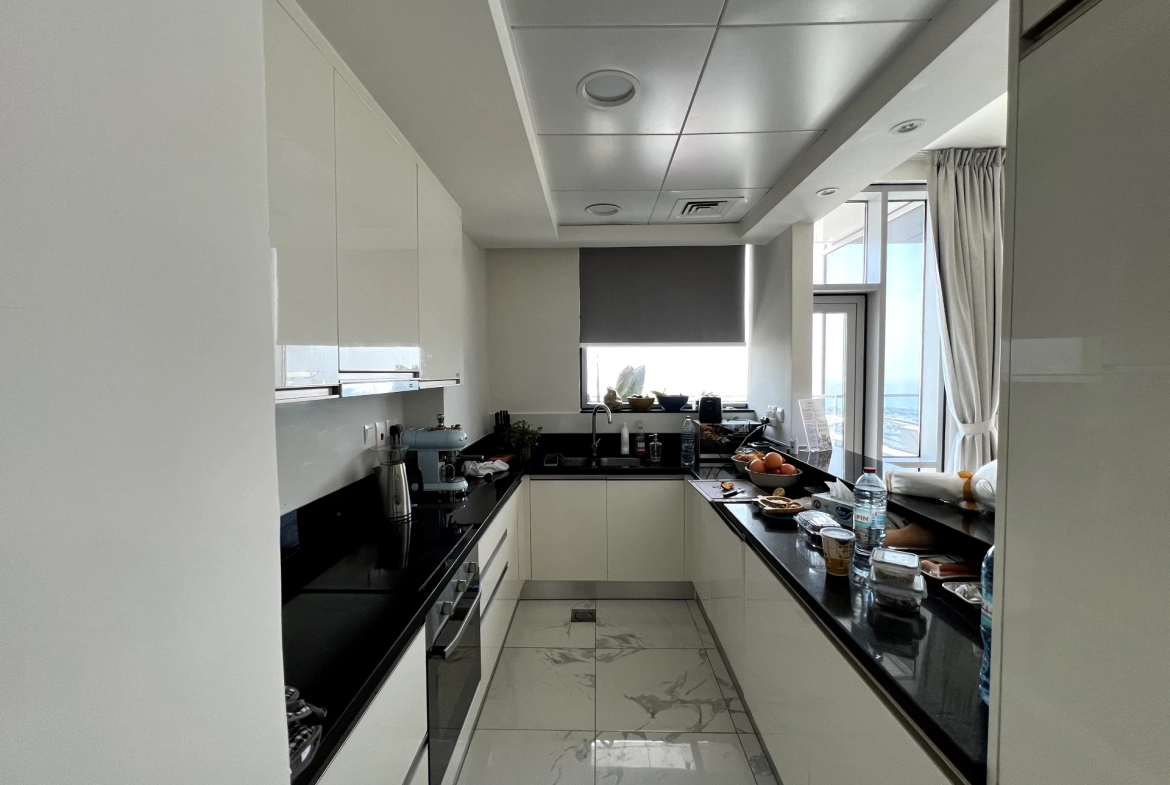 Kitchen view in a resale 3-bedroom apartment in Amna Al Habtoor, Dubai.